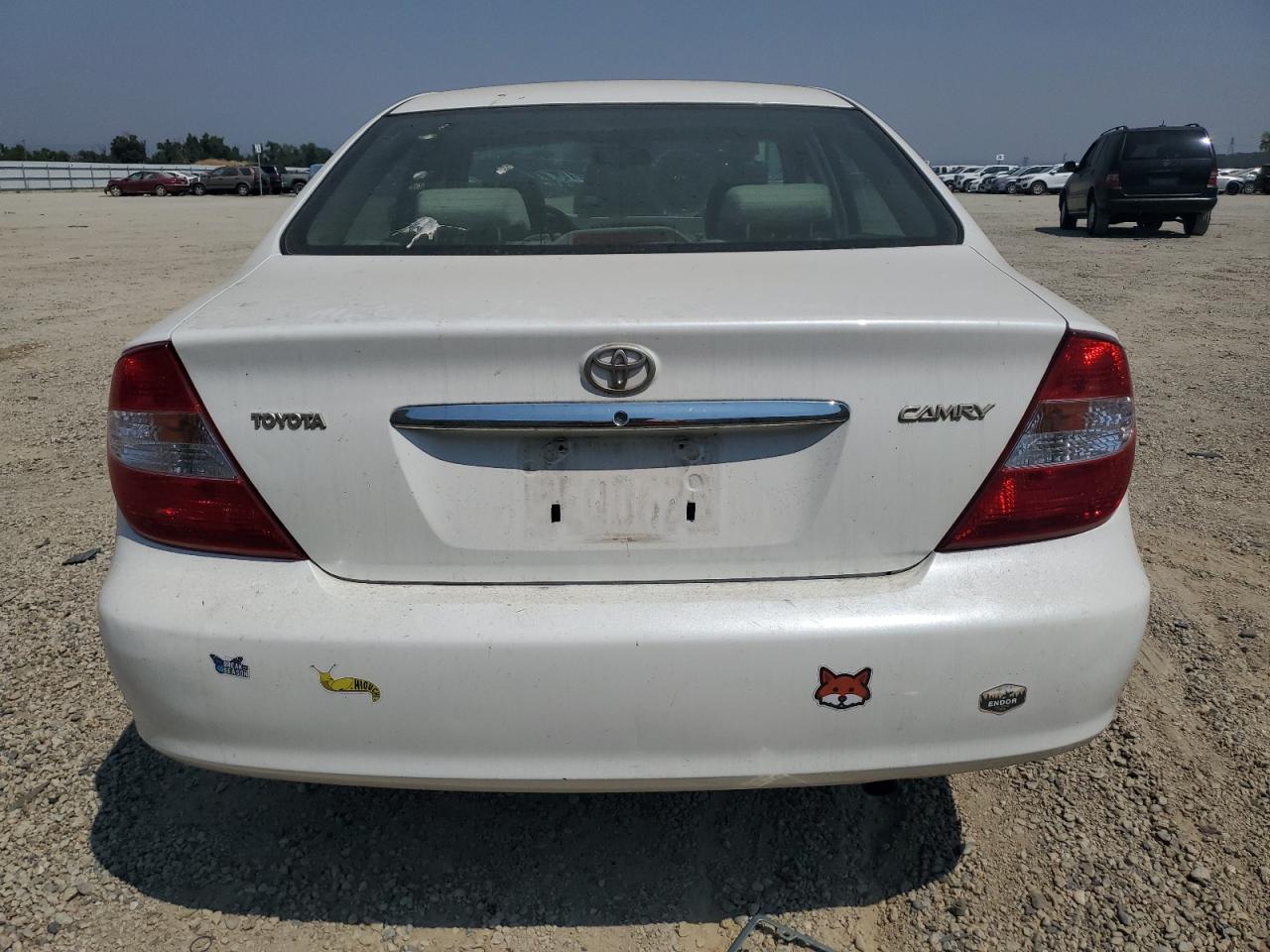 2004 Toyota Camry Le VIN: JTDBE30K240253730 Lot: 65477014