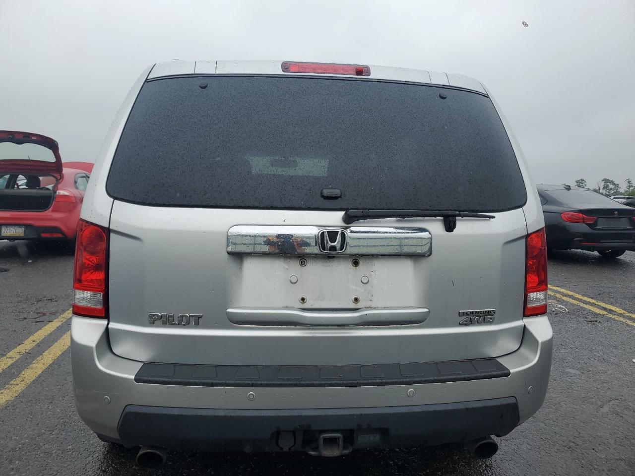 2010 Honda Pilot Touring VIN: 5FNYF4H92AB008275 Lot: 66695314