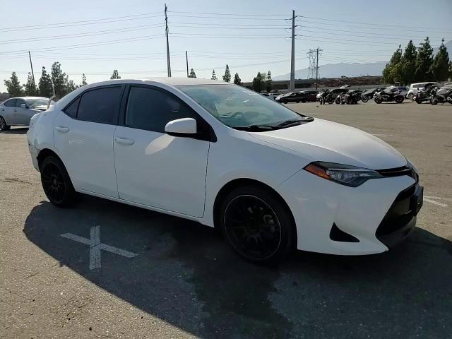 2017 Toyota Corolla L VIN: 5YFBURHE9HP613124 Lot: 66539414