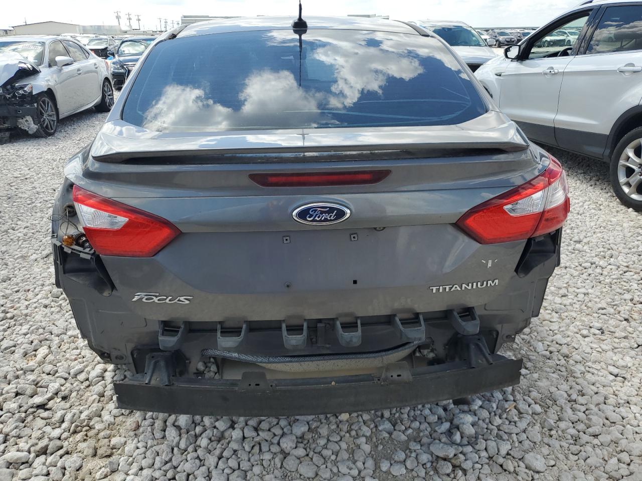 2014 Ford Focus Titanium VIN: 1FADP3J26EL259828 Lot: 69645494