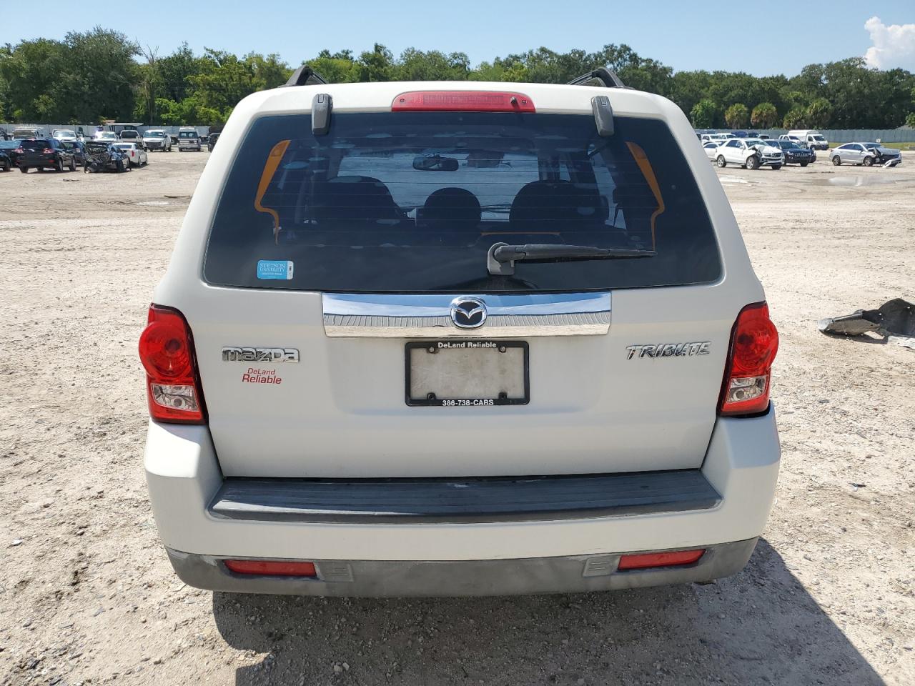 2009 Mazda Tribute I VIN: 4F2CZ02709KM04298 Lot: 67469944