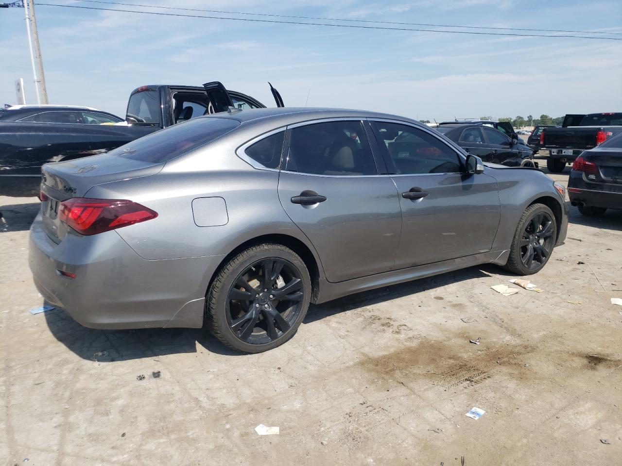 2015 Infiniti Q70 3.7 VIN: JN1BY1AR0FM561730 Lot: 67264664