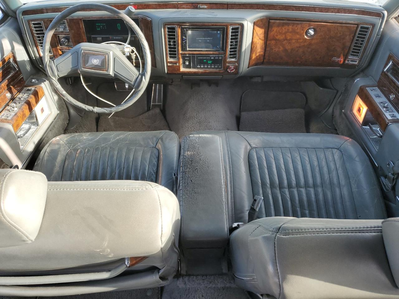 1991 Cadillac Brougham VIN: 1G6DW5477MR724390 Lot: 65557584