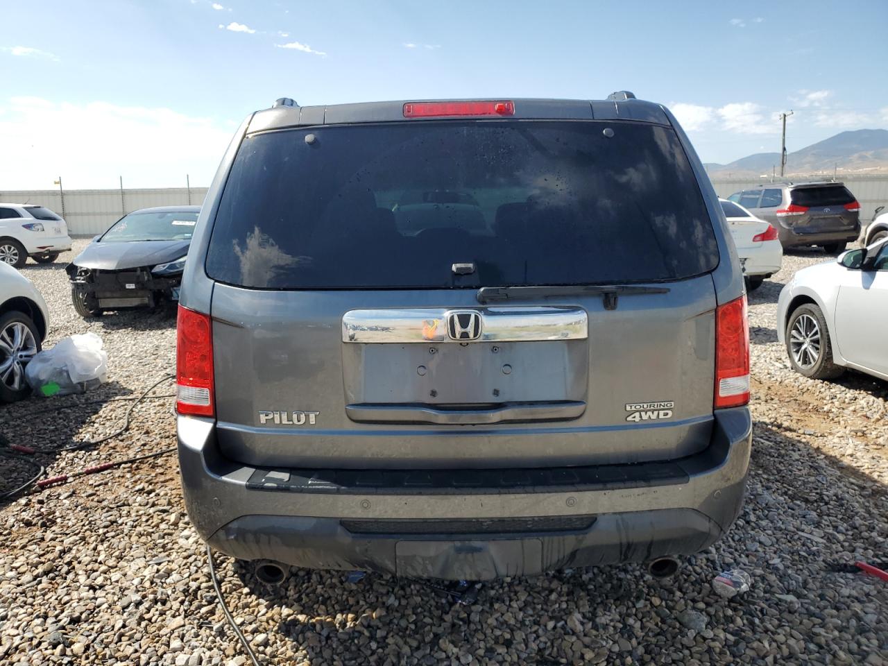 2012 Honda Pilot Touring VIN: 5FNYF4H98CB028887 Lot: 67050214