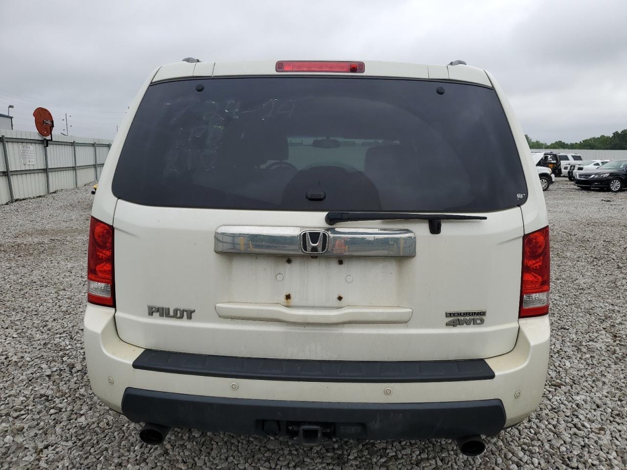 2011 Honda Pilot Touring VIN: 5FNYF4H92BB071328 Lot: 65141704