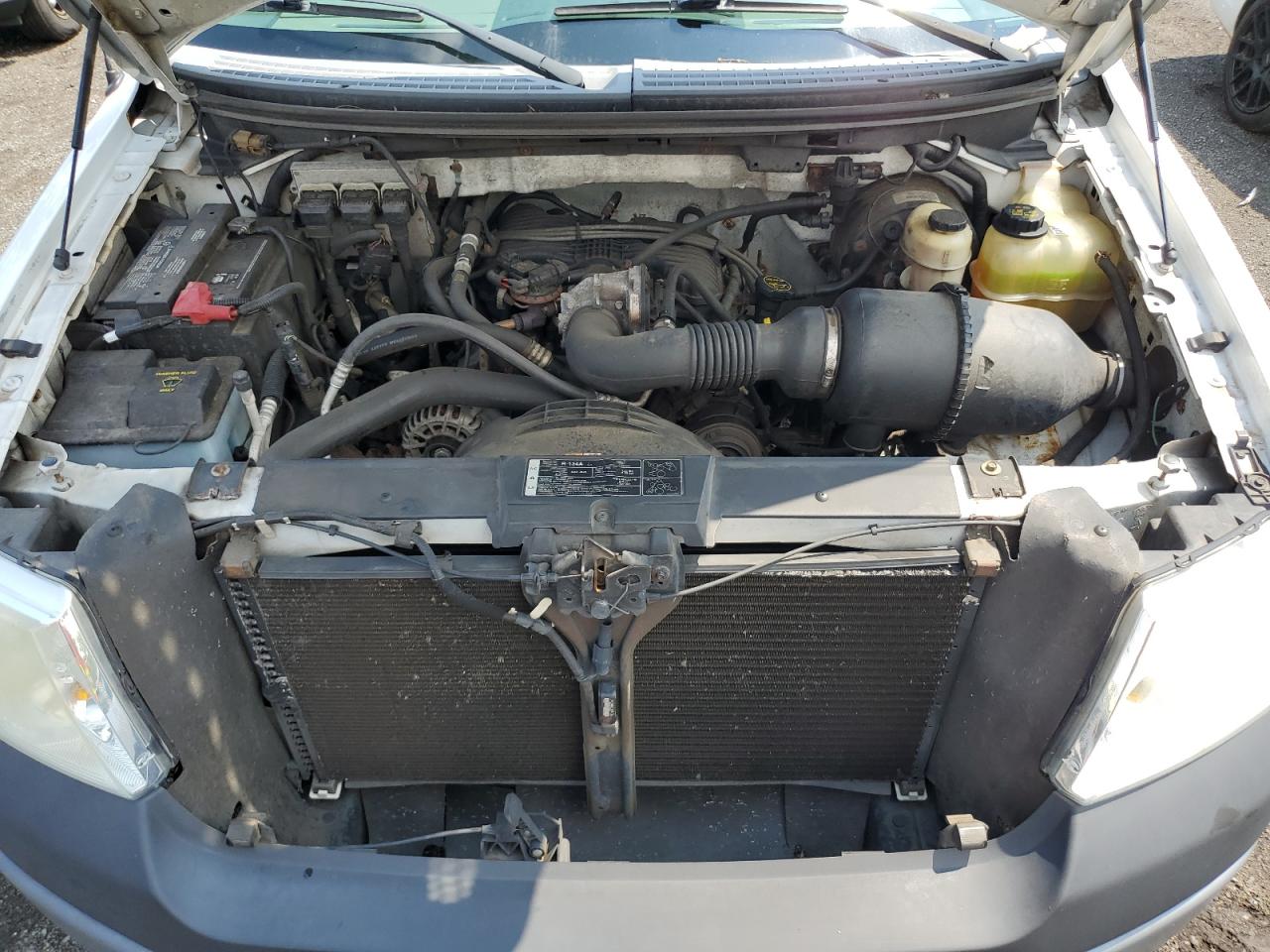 2007 Ford F150 VIN: 1FTRF12257NA49718 Lot: 66280544