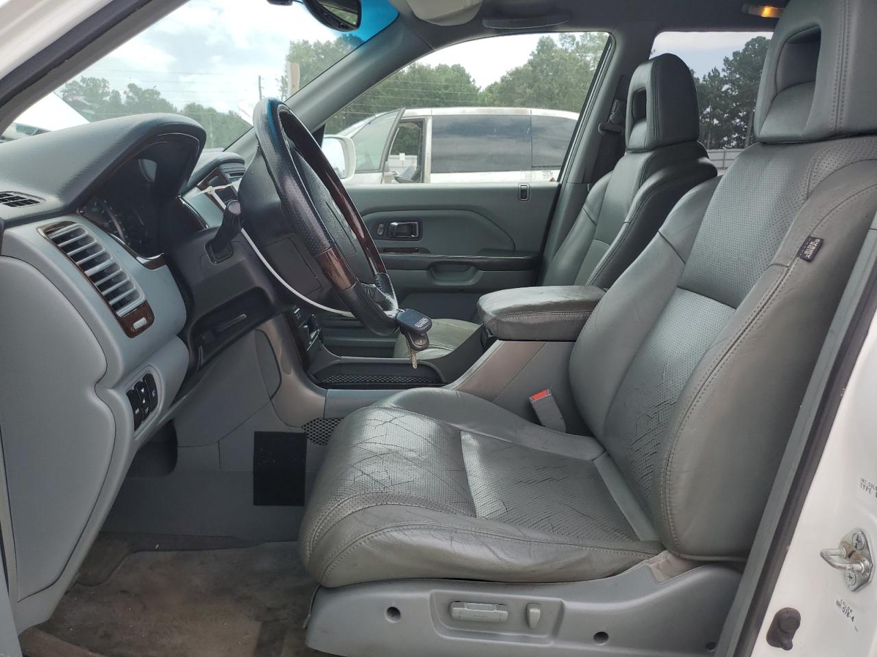 2004 Honda Pilot Exl VIN: 2HKYF18664H500852 Lot: 68562014