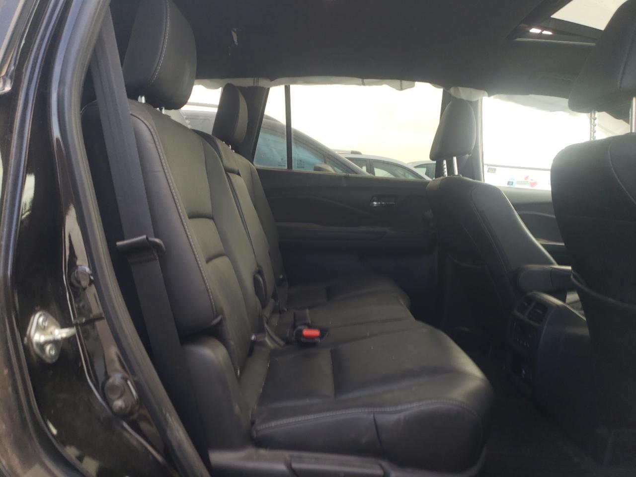 2020 Honda Passport Elite VIN: 5FNYF8H09LB013937 Lot: 65032544