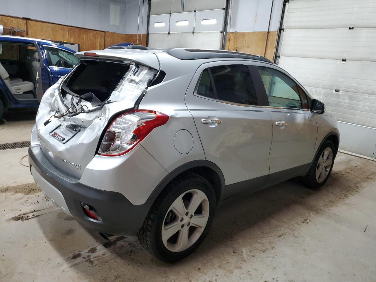 2015 BUICK ENCORE with REAR END damage, VIN KL4CJGSB0FB093868