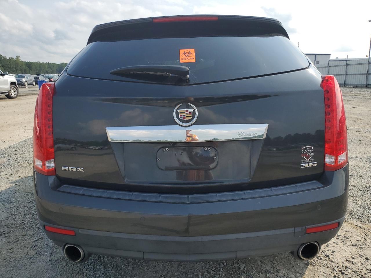 2014 Cadillac Srx Luxury Collection VIN: 3GYFNBE34ES629099 Lot: 67094754