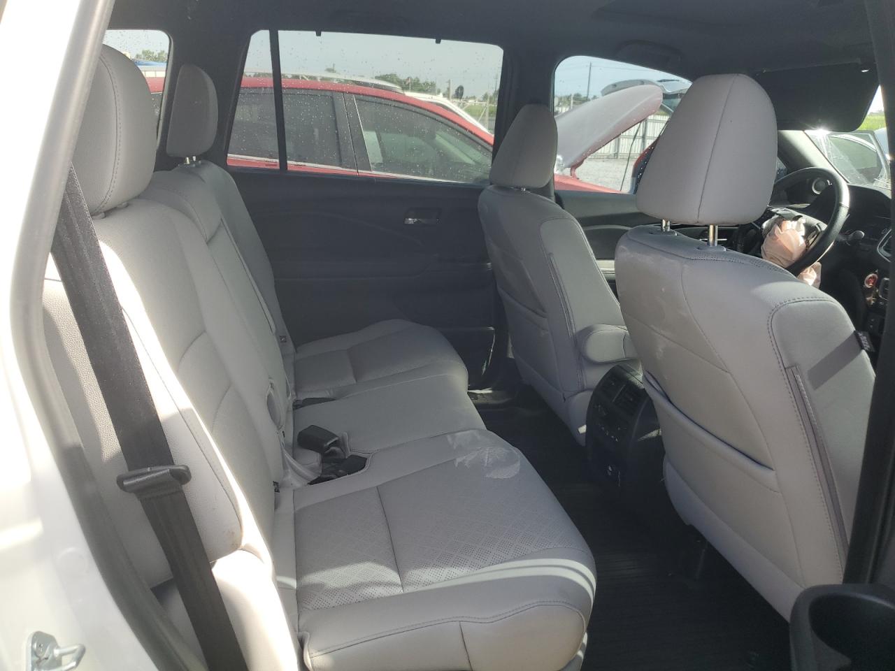 2021 Honda Passport Elite VIN: 5FNYF8H00MB006280 Lot: 64890924