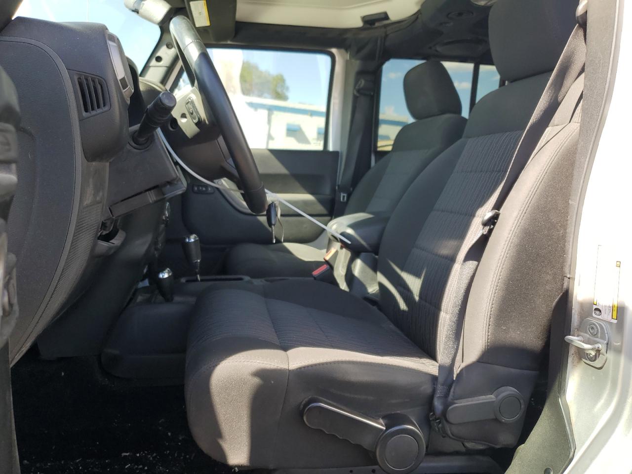 2012 Jeep Wrangler Unlimited Sport VIN: 1C4BJWDG9CL259282 Lot: 65523174