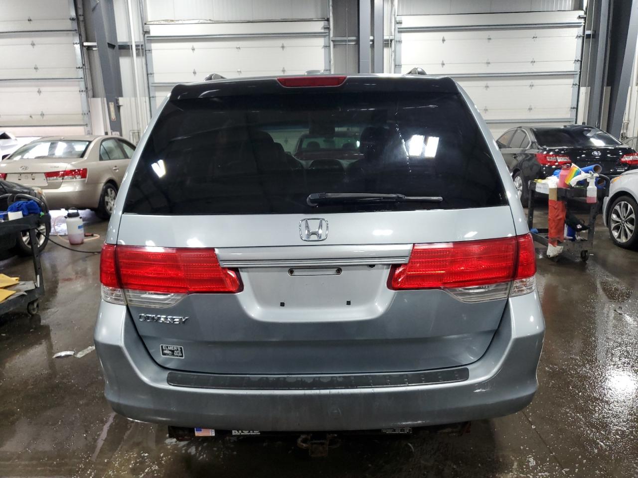 2010 Honda Odyssey Exl VIN: 5FNRL3H79AB057981 Lot: 65465354