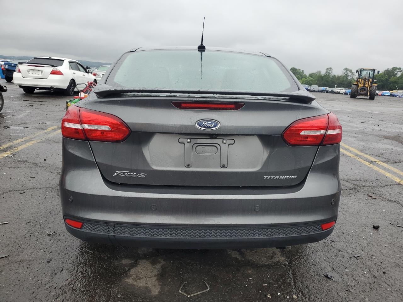 2017 Ford Focus Titanium VIN: 1FADP3J28HL207668 Lot: 66586844