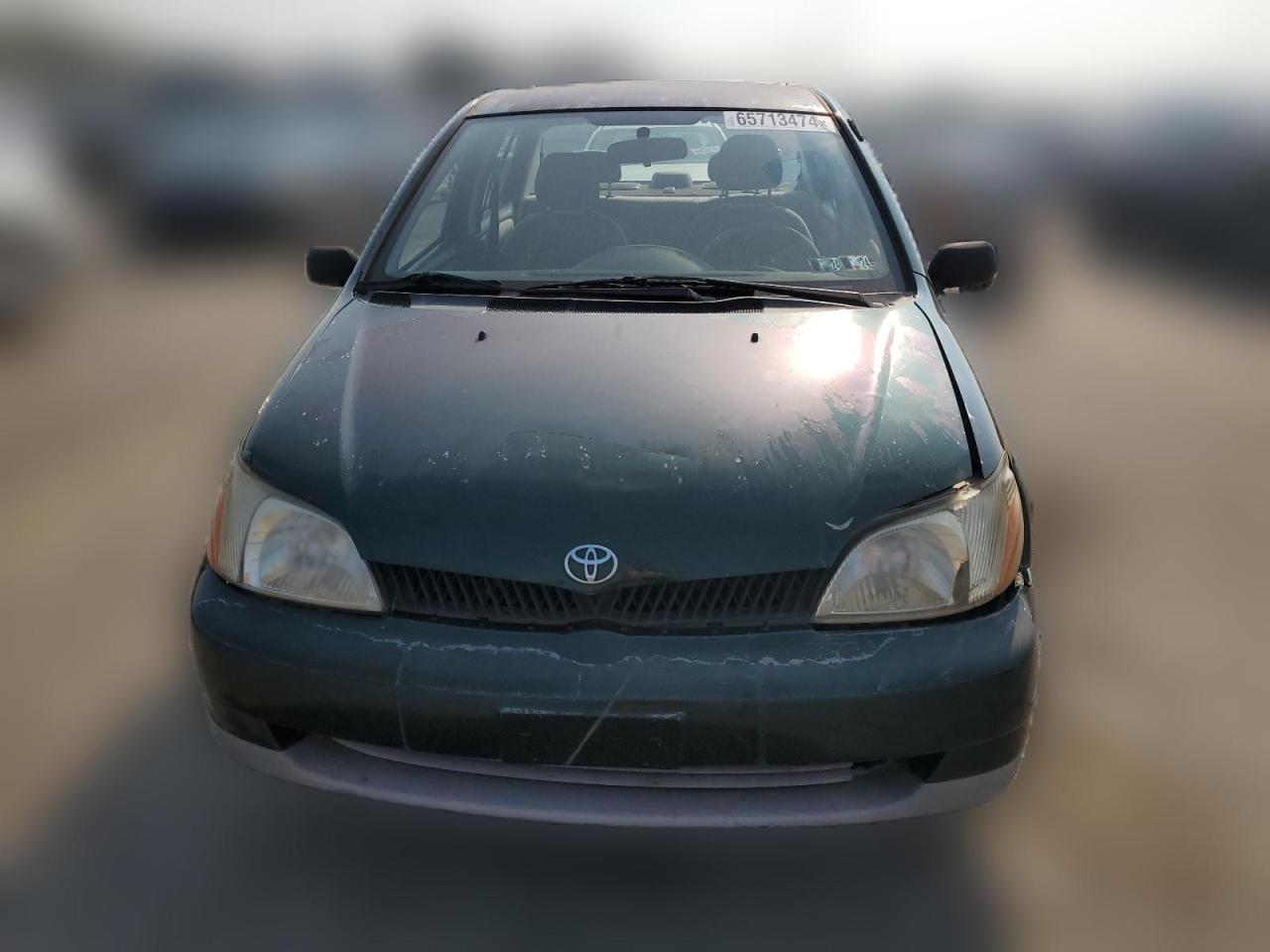 2000 Toyota Echo VIN: JTDBT1236Y0099299 Lot: 65713474