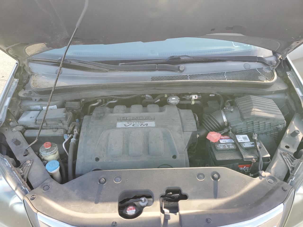 2009 Honda Odyssey Exl VIN: 5FNRL38629B411164 Lot: 67114444