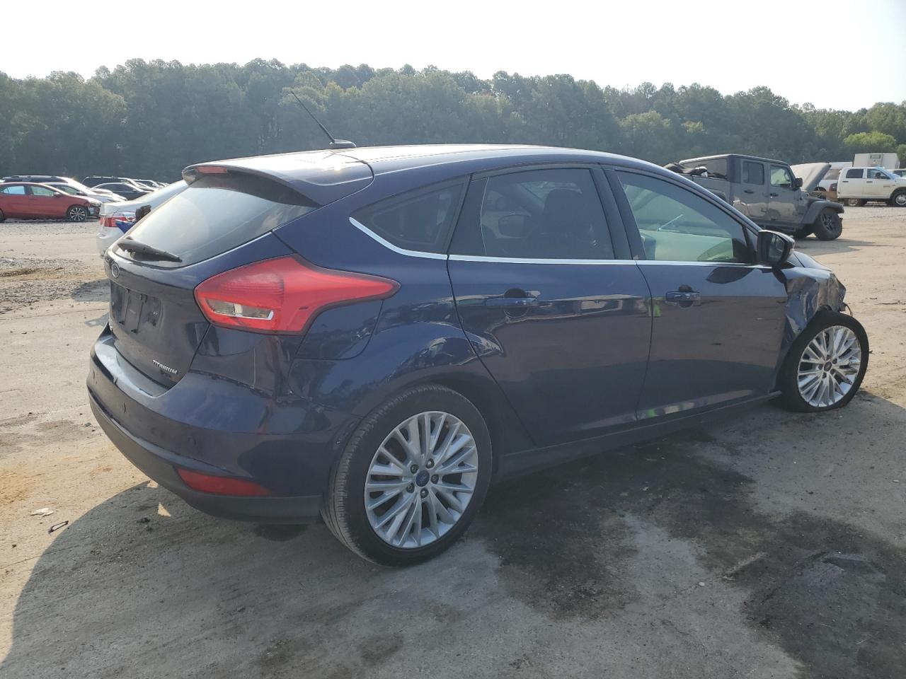 2017 Ford Focus Titanium VIN: 1FADP3N24HL212991 Lot: 67467374