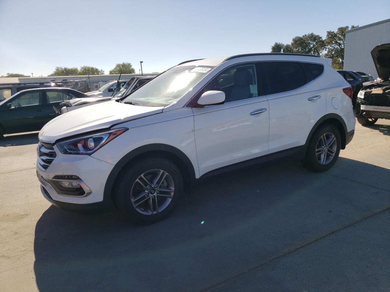 5NMZU3LB0HH003132 2017 HYUNDAI SANTA FE - Image 1