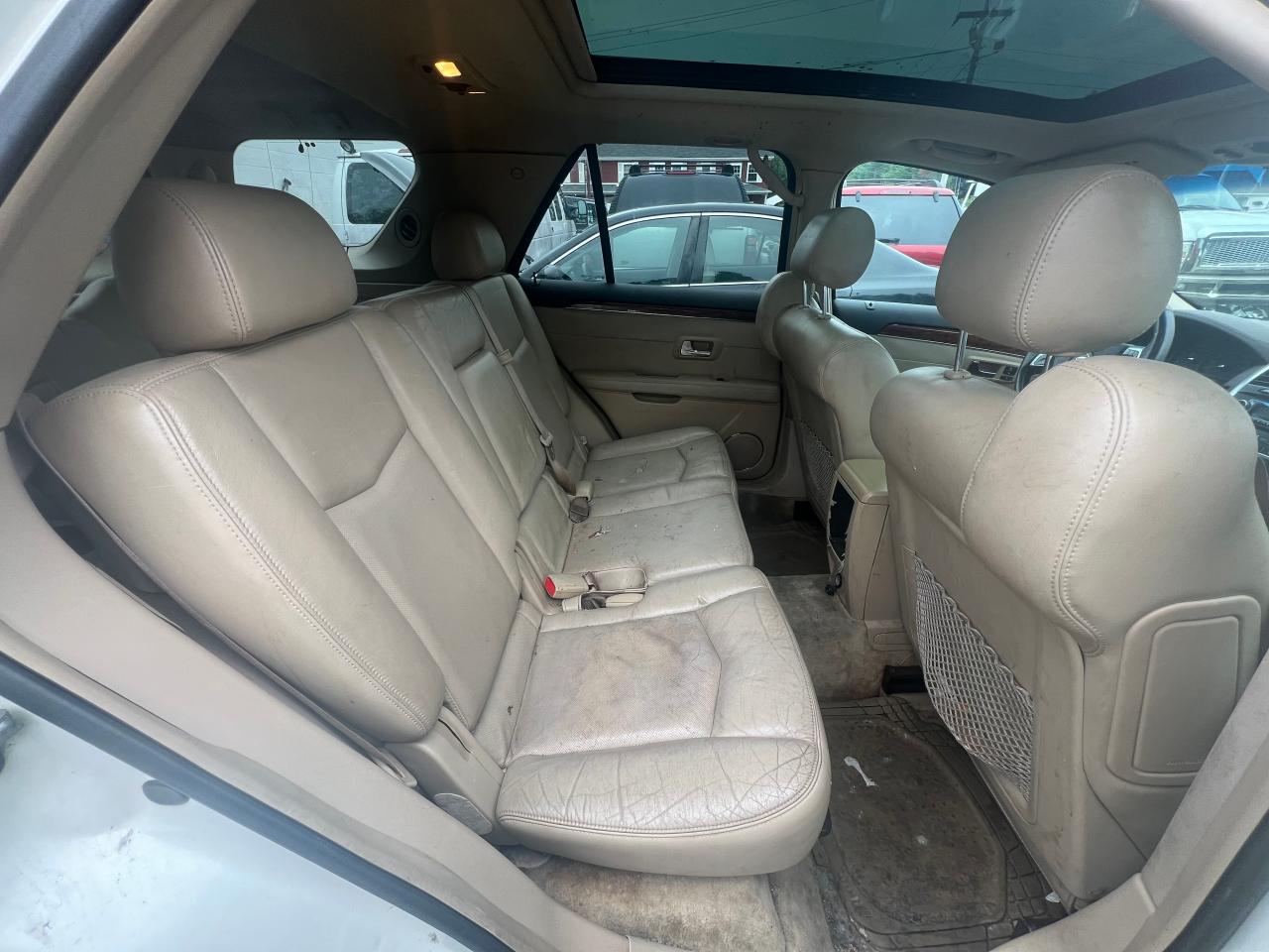 2008 Cadillac Srx VIN: 1GYEE637X80100387 Lot: 67319024