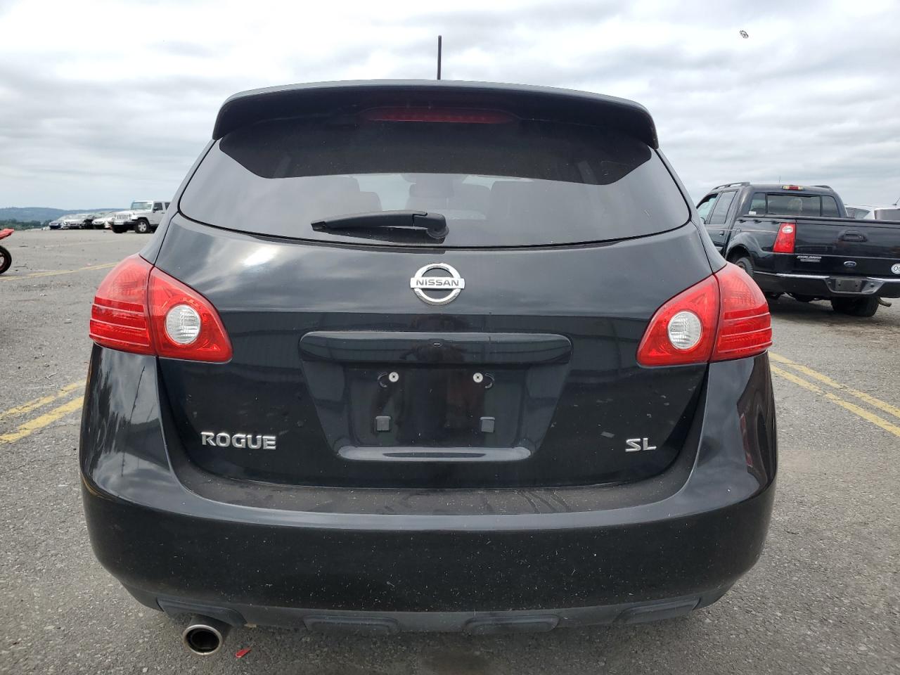 2009 Nissan Rogue S VIN: JN8AS58T79W052766 Lot: 69574894