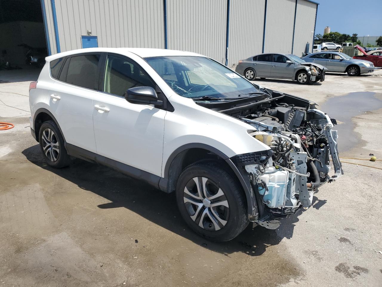 VIN JTMZFREV9HJ717503 2017 TOYOTA RAV4 no.4