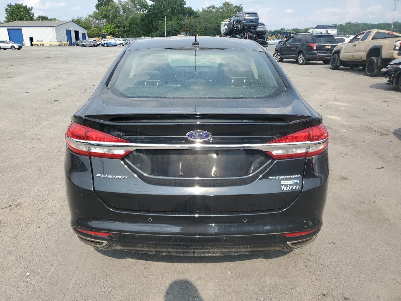 2018 Ford Fusion Titanium/Platinum VIN: 3FA6P0D98JR233940 Lot: 67010844