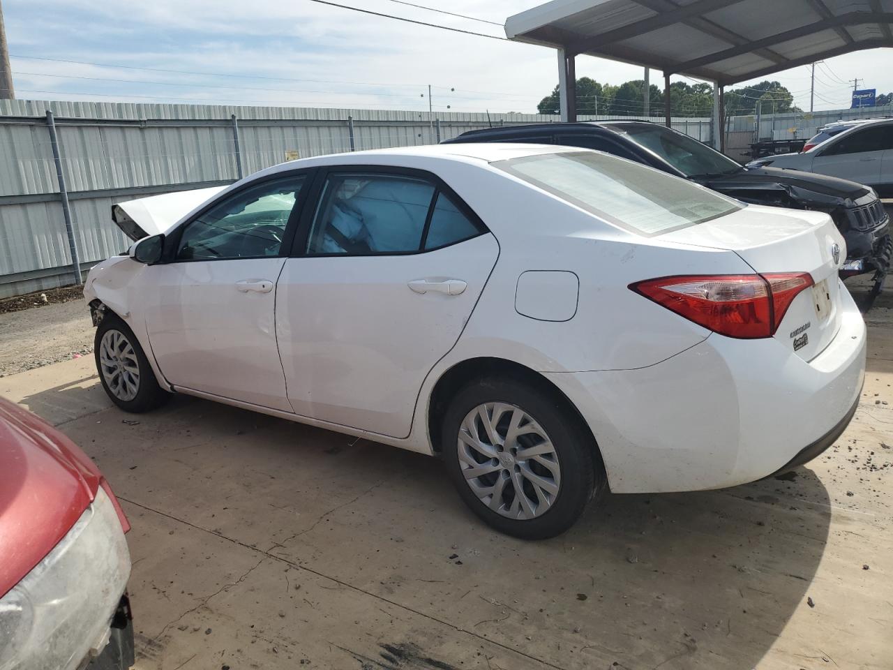 2017 Toyota Corolla L VIN: 5YFBURHE9HP709853 Lot: 68584384