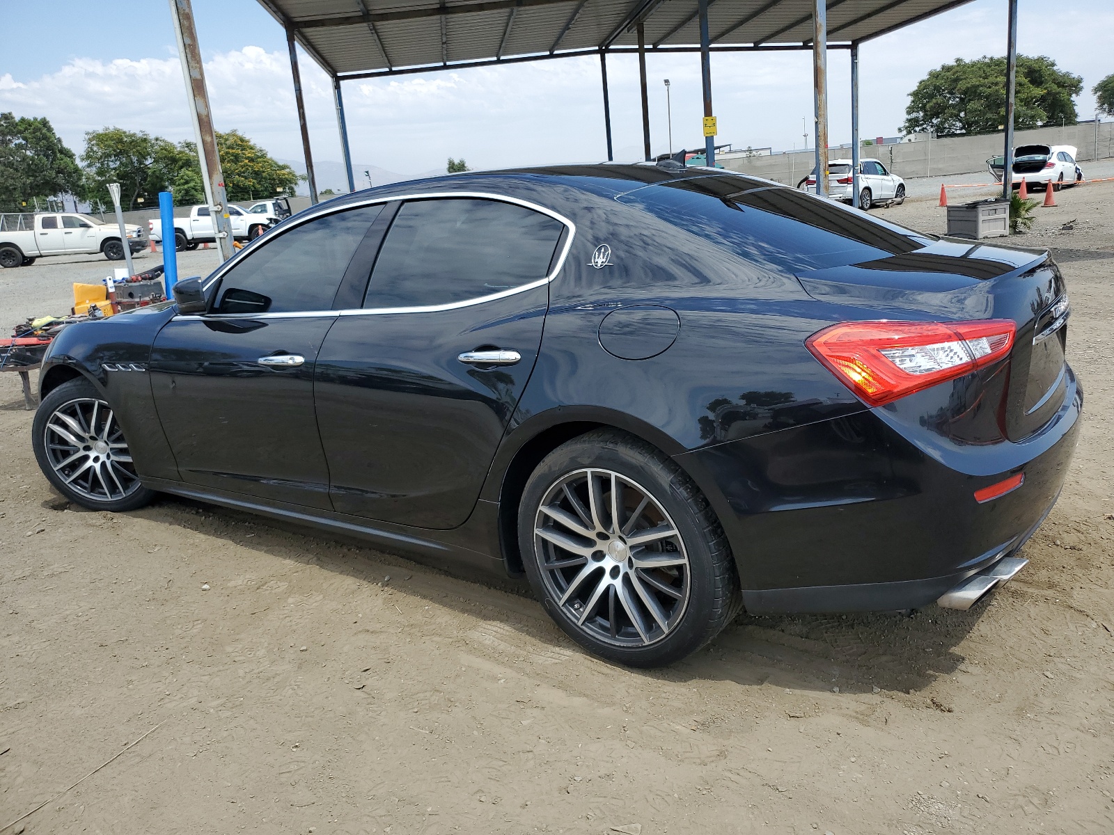 2014 Maserati Ghibli vin: ZAM57XSA5E1090243