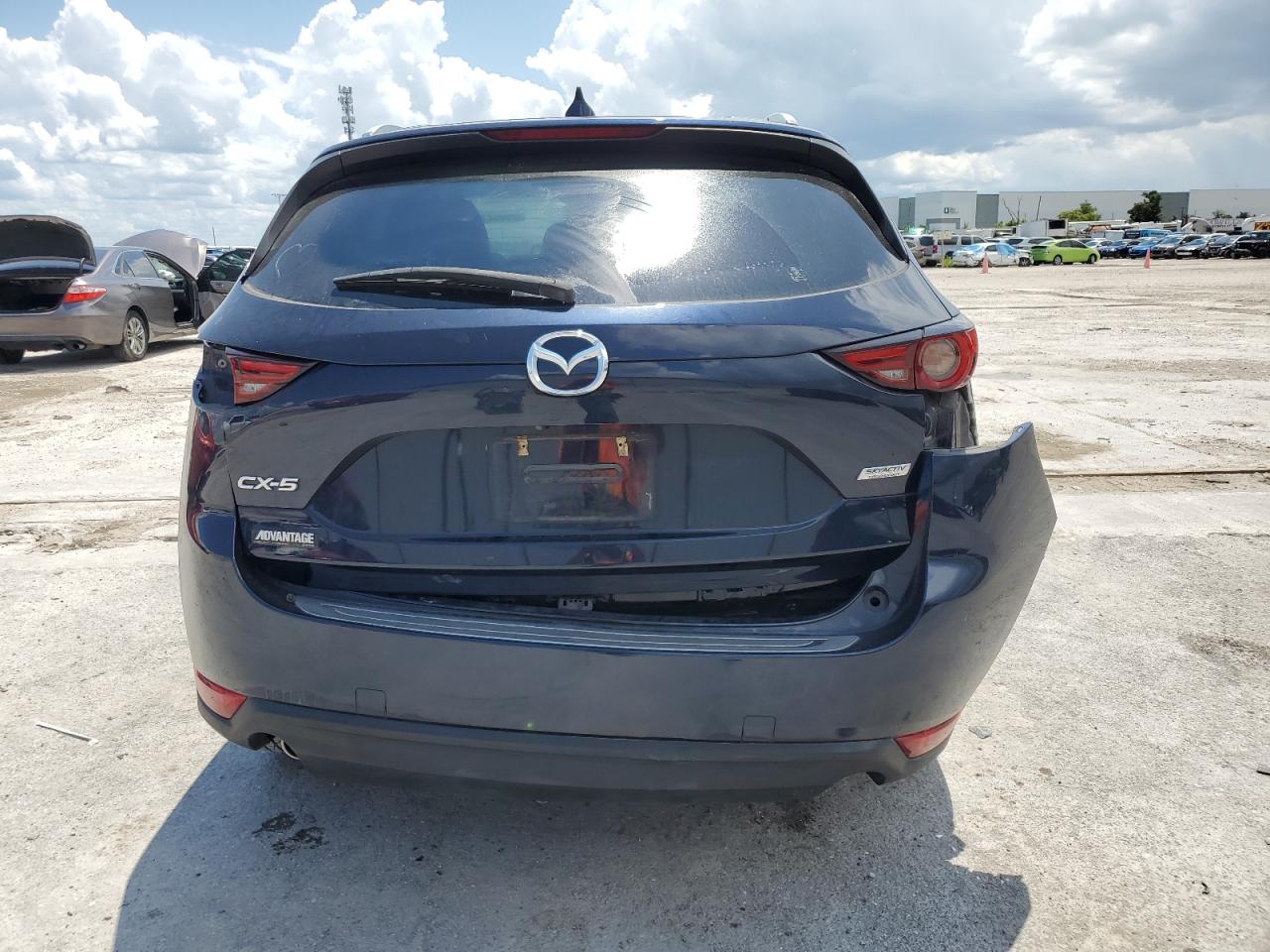 2019 Mazda Cx-5 Grand Touring VIN: JM3KFADM6K0682886 Lot: 66652384