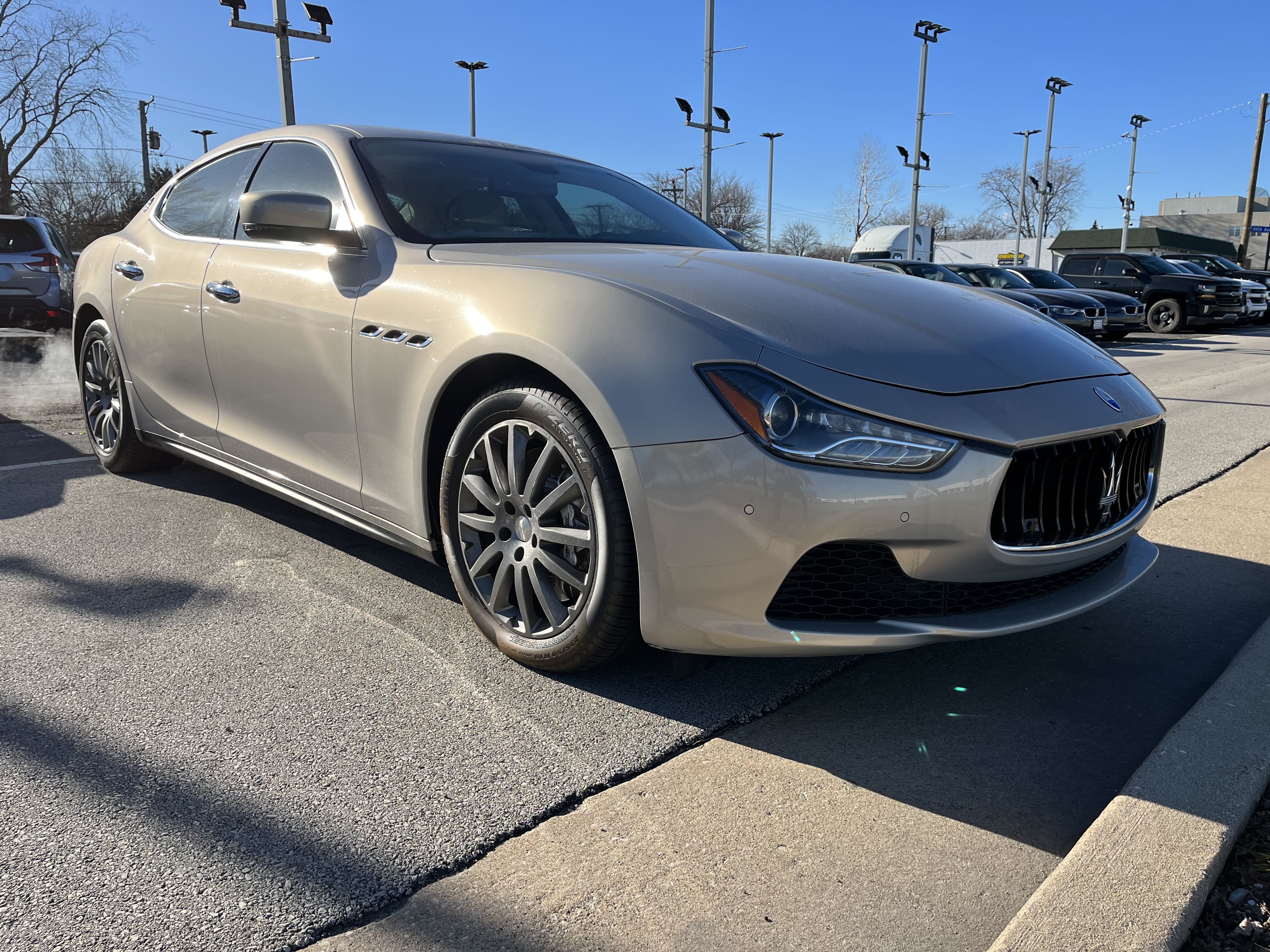 2014 Maserati Ghibli S vin: ZAM57RTA4E1087716