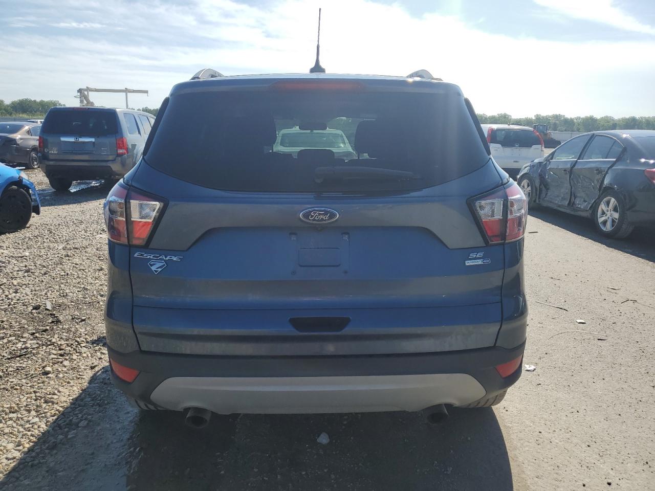 2018 Ford Escape Se VIN: 1FMCU9GD6JUB38758 Lot: 65798824