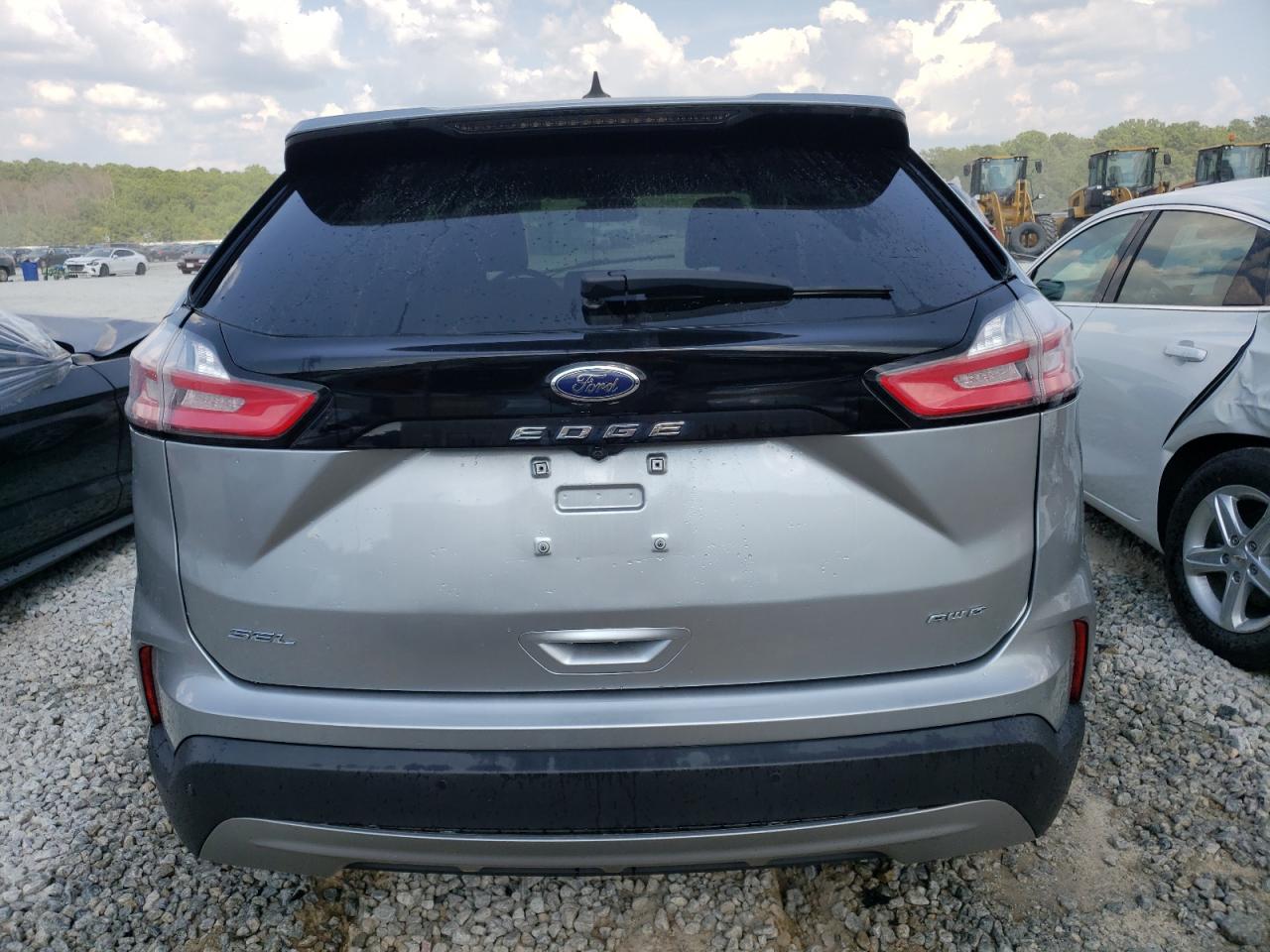2021 Ford Edge Sel VIN: 2FMPK4J9XMBA05719 Lot: 67024994