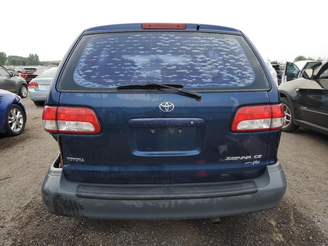 2002 Toyota Sienna Ce VIN: 4T3ZF19C92U457915 Lot: 65119584