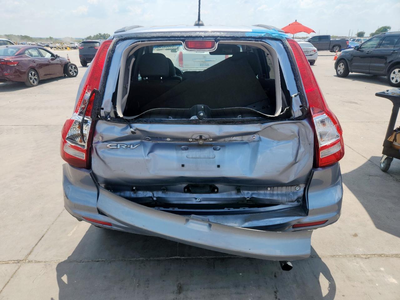 2010 Honda Cr-V Exl VIN: JHLRE3H74AC007886 Lot: 69008245