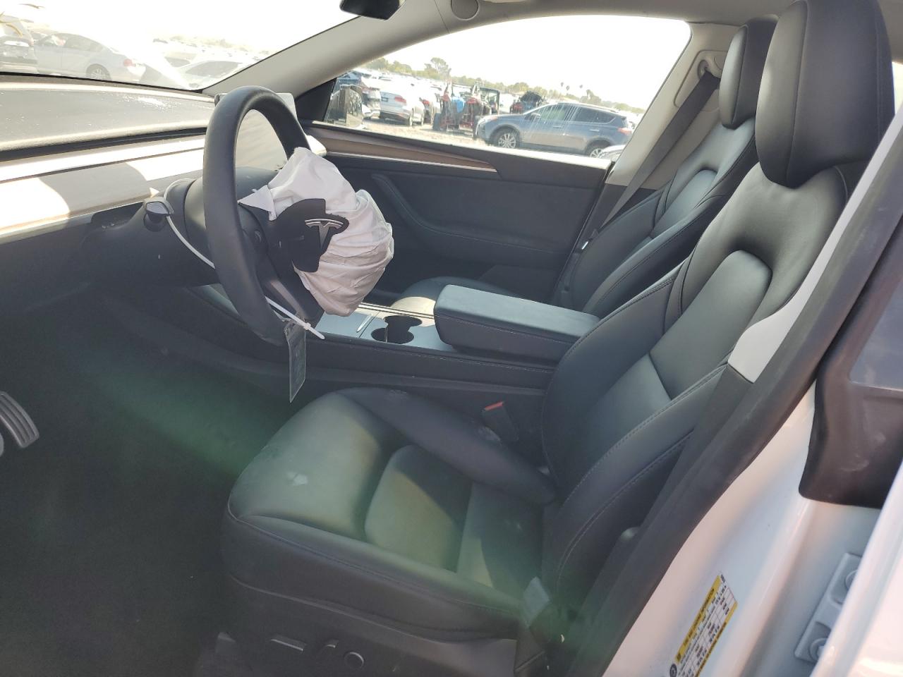 2023 Tesla Model Y VIN: 7SAYGDEF8PF870516 Lot: 80911025