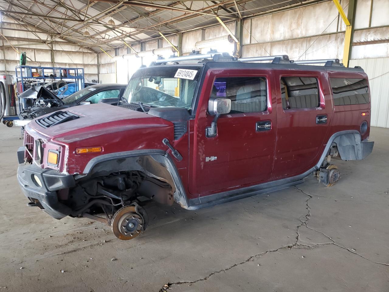 HUMMER H2 2003. Lot# 69124845. VIN 5GRGN23U03H117494. Photo 1