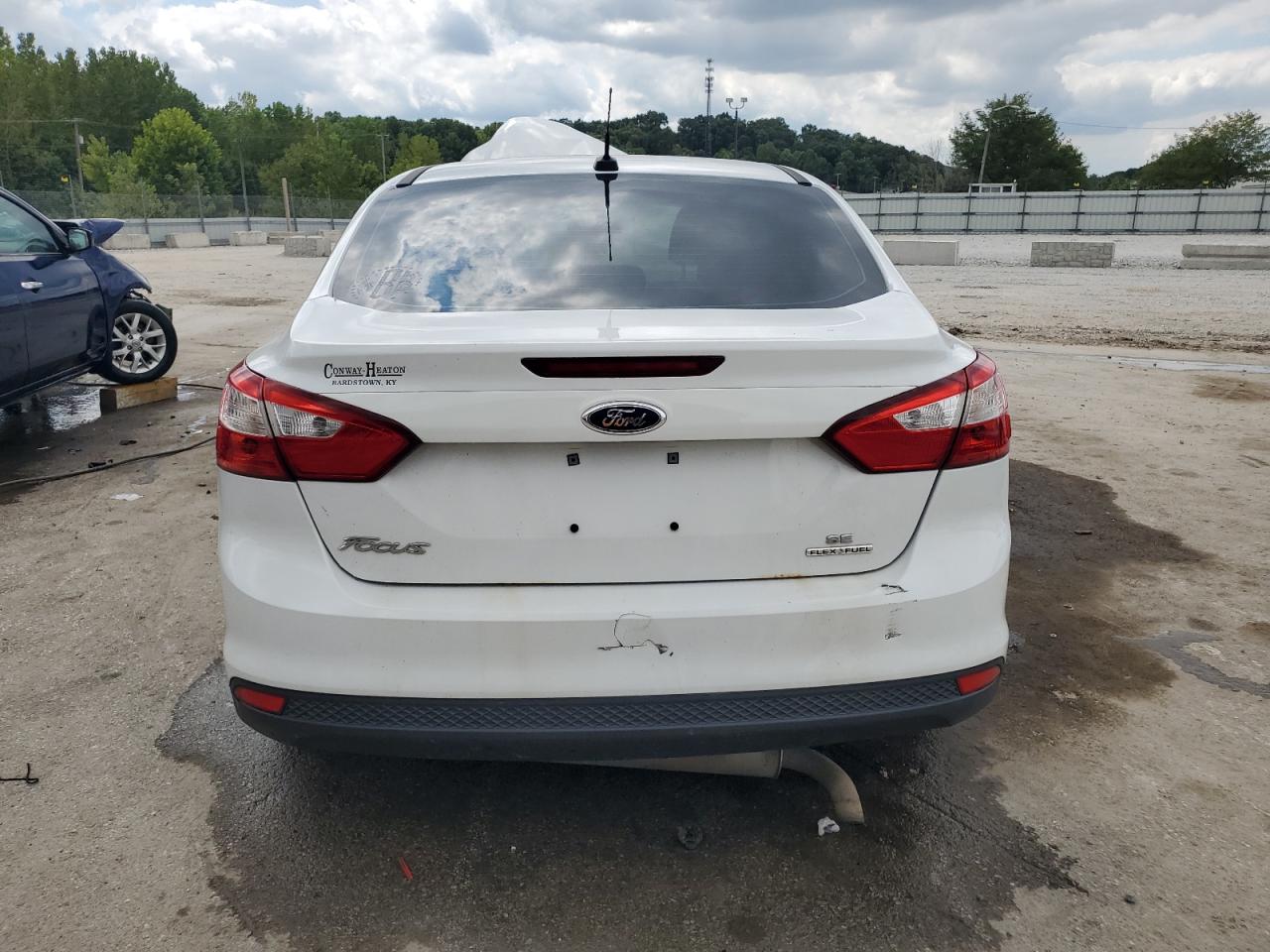 2014 Ford Focus Se VIN: 1FADP3F28EL223132 Lot: 70185845