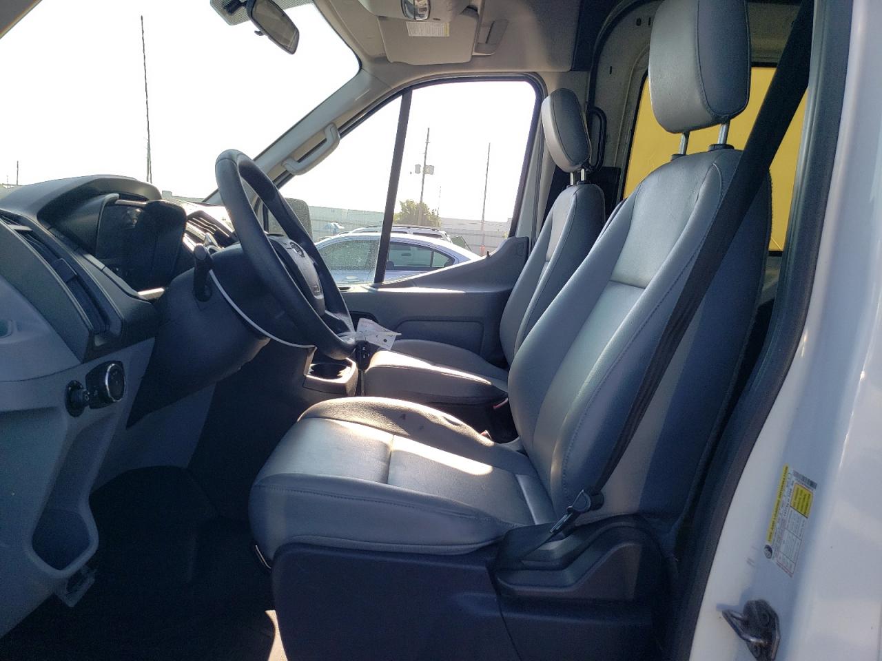 2015 Ford Transit T-150 VIN: 1FTNE2CM7FKA08773 Lot: 69261025