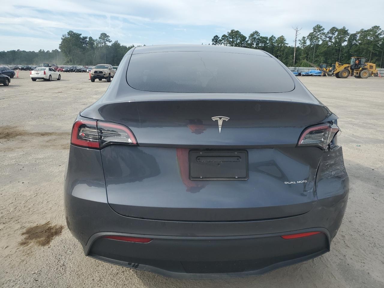 2023 Tesla Model Y VIN: 7SAYGAEE7PF912809 Lot: 70664265
