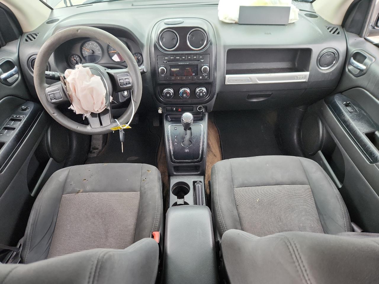 2014 Jeep Compass Sport VIN: 1C4NJCBA3ED772129 Lot: 70600535