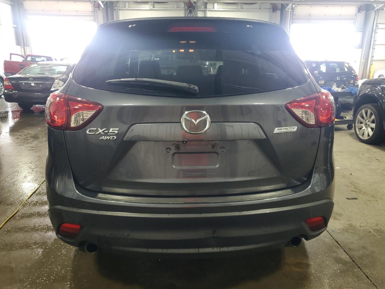 2014 Mazda Cx-5 Touring VIN: JM3KE4CY3E0406243 Lot: 70932775