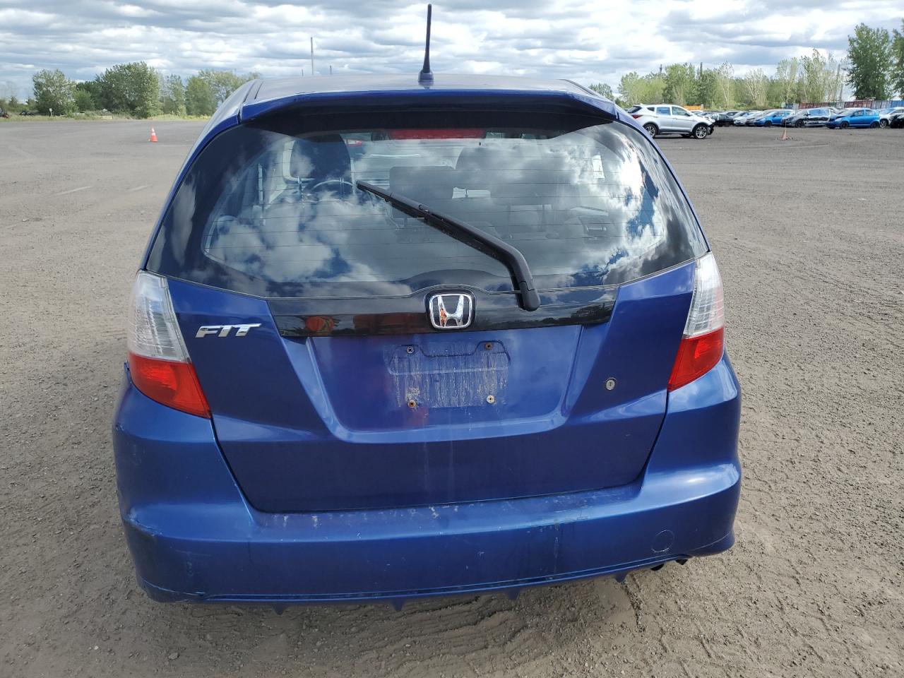 2009 Honda Fit VIN: JHMGE88229S805194 Lot: 70131745
