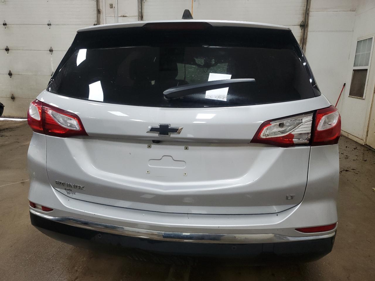 2018 Chevrolet Equinox Lt VIN: 2GNAXJEV9J6325403 Lot: 69866715