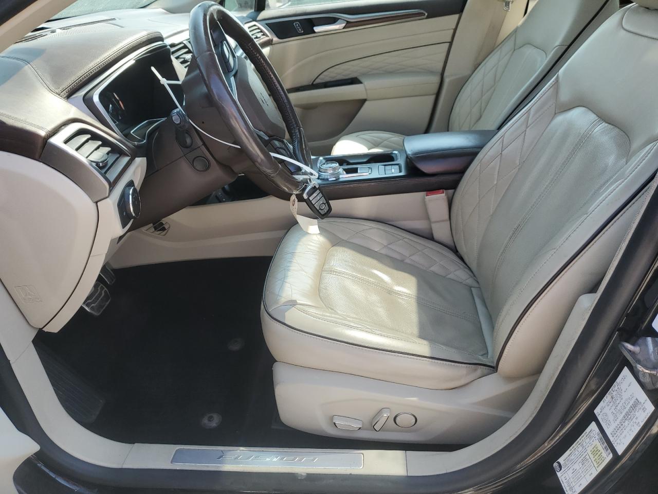 2017 Ford Fusion Titanium Phev VIN: 3FA6P0SU0HR127709 Lot: 66604365