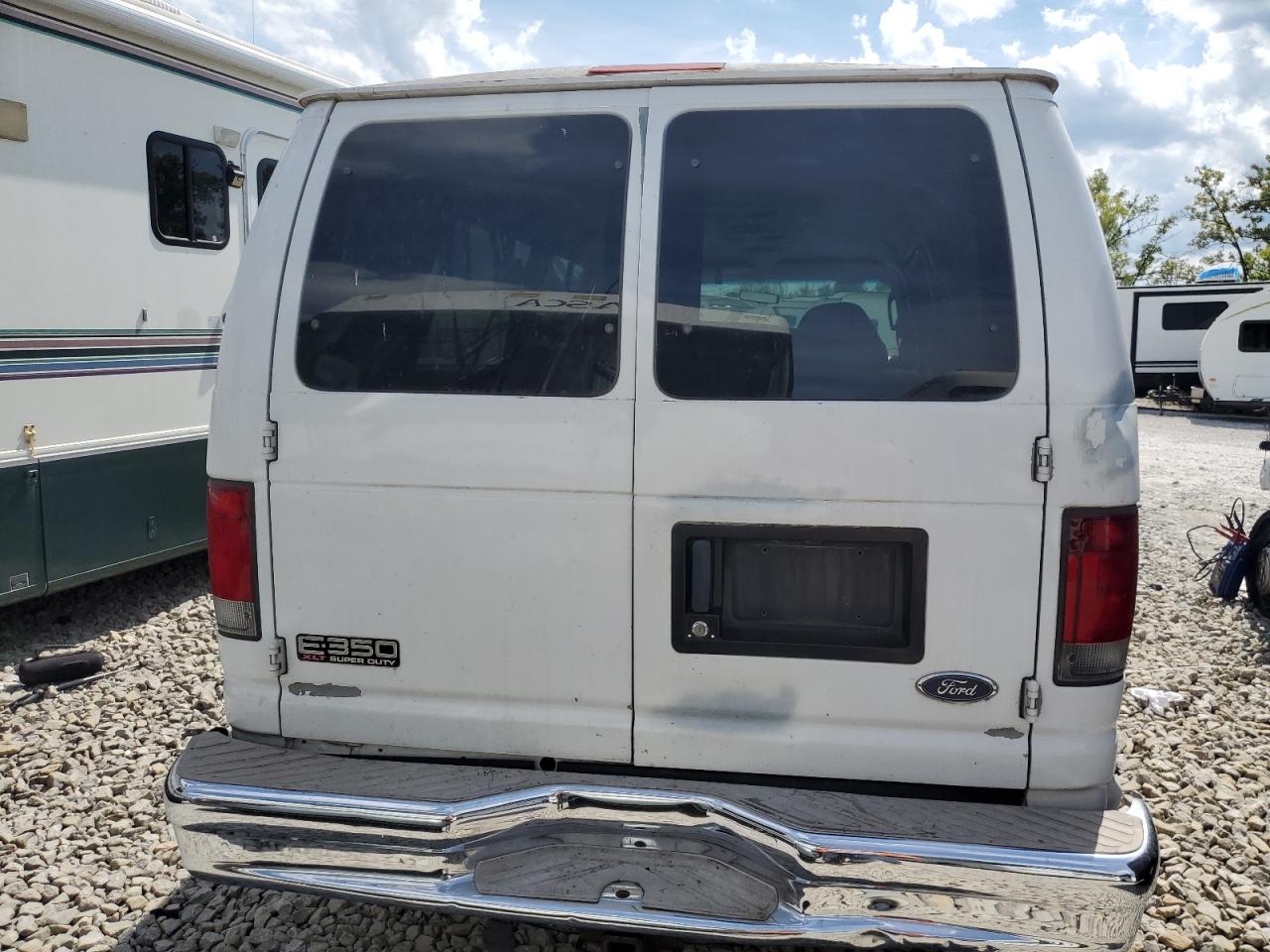 2004 Ford Econoline E350 Super Duty Wagon VIN: 1FBSS31S34HA11476 Lot: 70597465