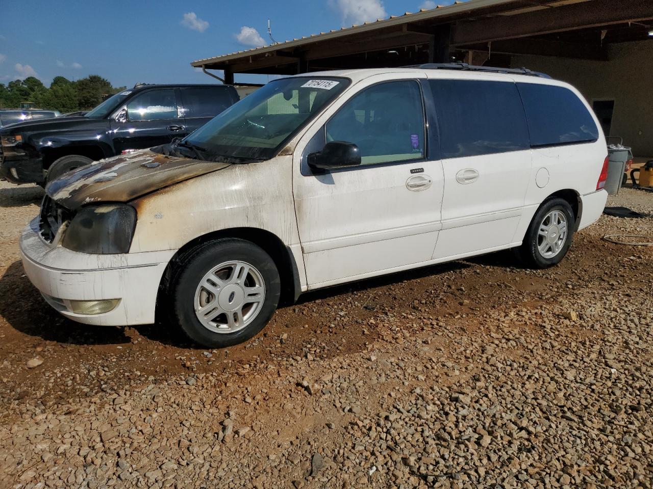 FORD FREESTAR 2004. Lot# 70154115. VIN 2FMDA52224BA01404. Photo 1