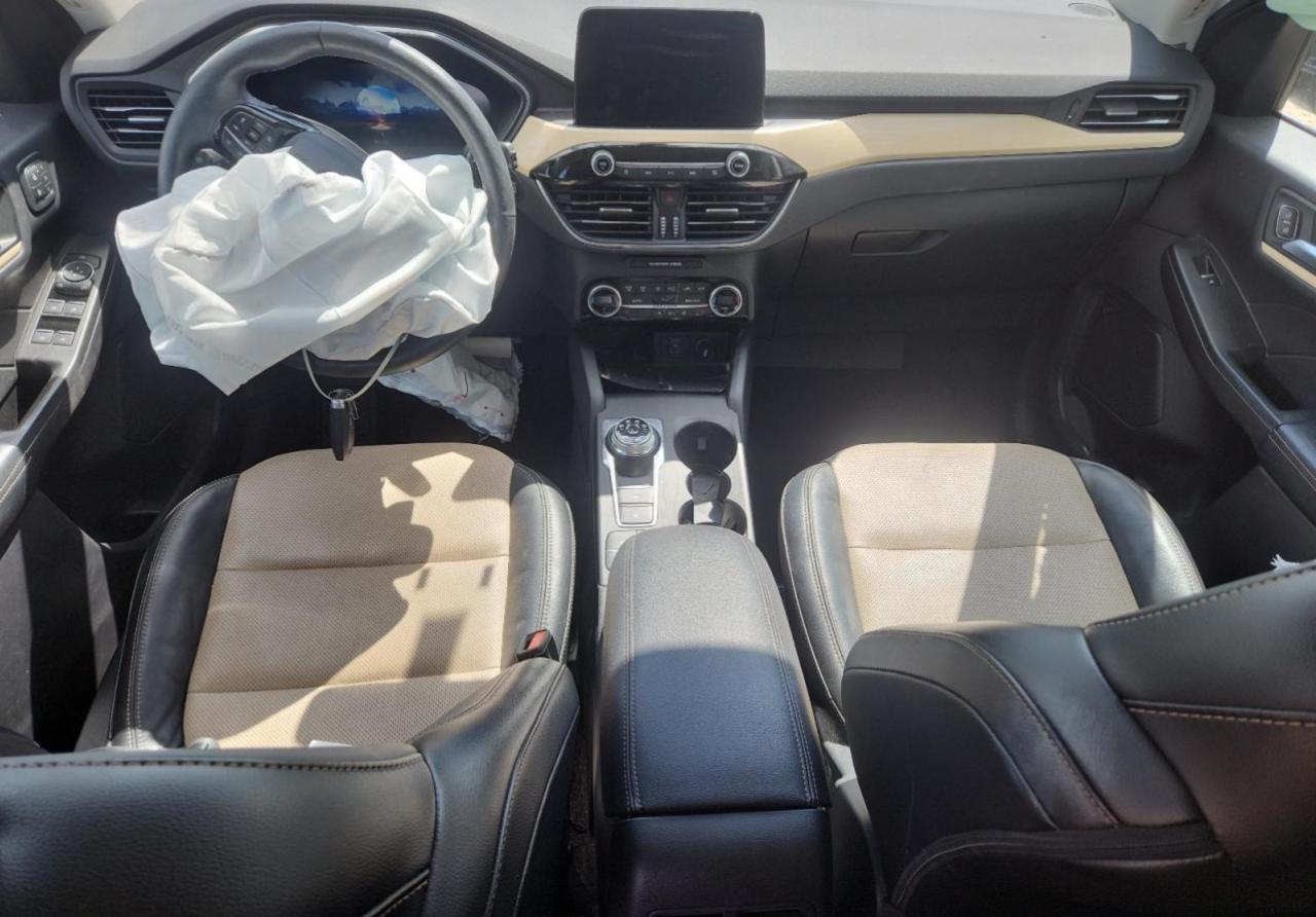 2021 Ford Escape Titanium VIN: 1FMCU9J96MUA33792 Lot: 69869145