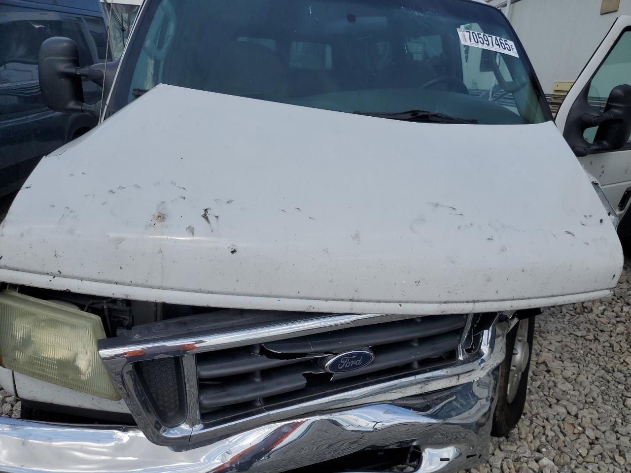 2004 Ford Econoline E350 Super Duty Wagon VIN: 1FBSS31S34HA11476 Lot: 70597465