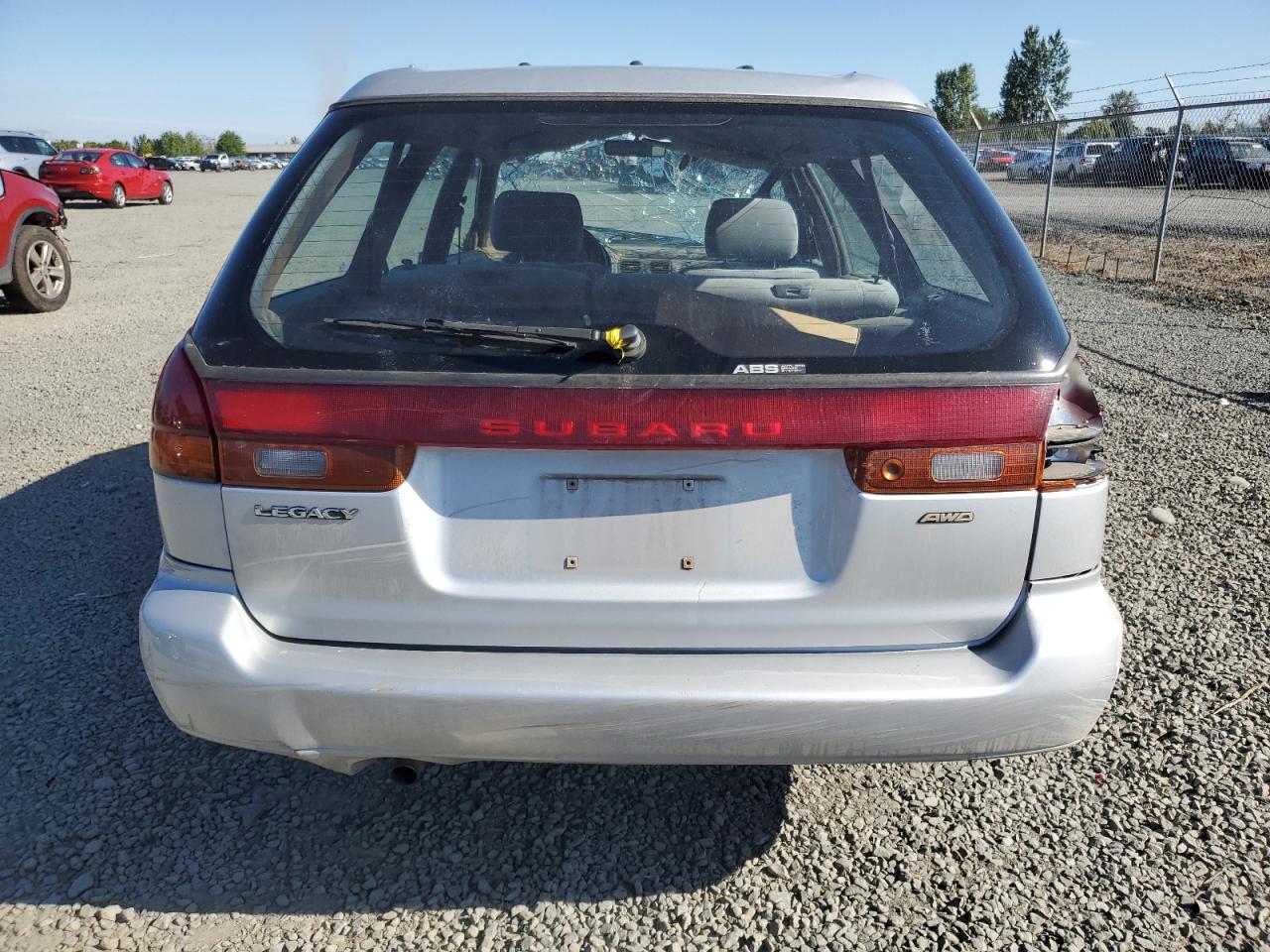 1997 Subaru Legacy L VIN: 4S3BK4359V6307186 Lot: 68880905