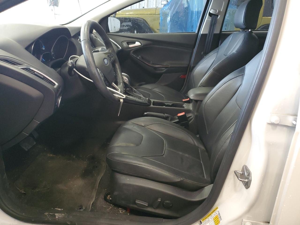 2017 Ford Focus Titanium VIN: 1FADP3J26HL331812 Lot: 67916645